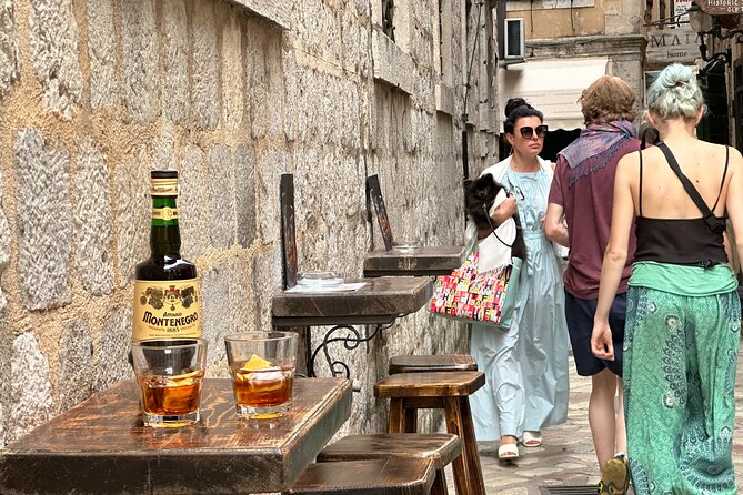 3 Hour Kotor Food Tour - Rick Steves' Recommended - A hidden-corner lunch moment: black risotto with squid and red wine
