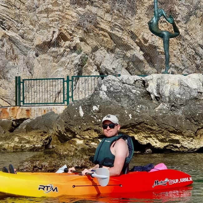 Budva: 3-Hour Paddle Board or Kayak Tour to Coastal Caves - The Budva Dancing Girl stop: quick, fun, and made for photos
