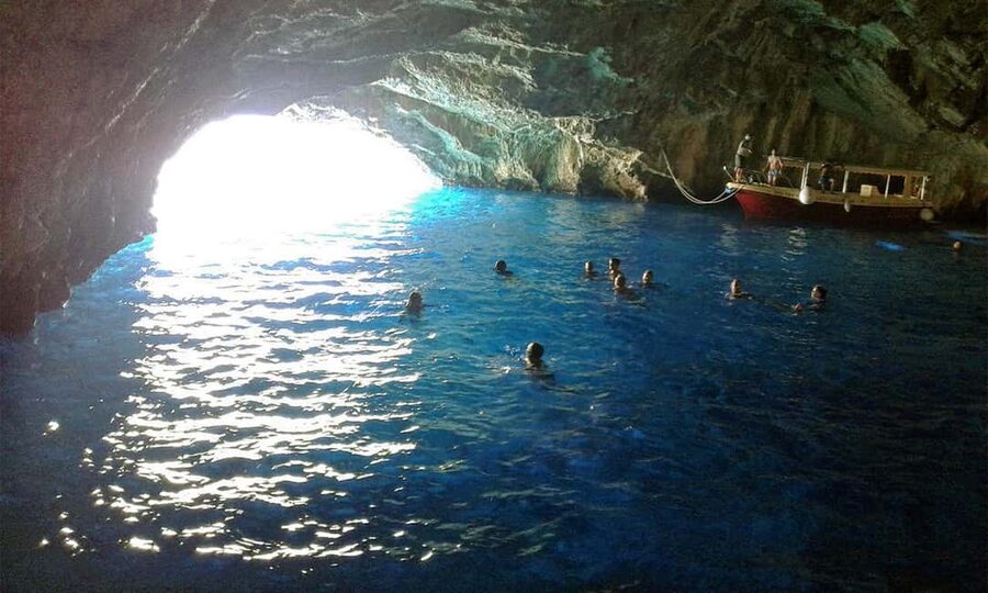 Deluxe excursion from Budva: Blue Cave tour - Trsteno Beach break: sandy time between two capes