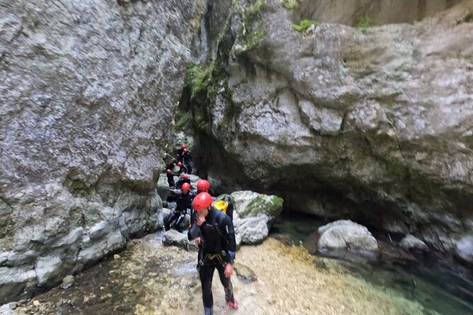 Explore the Thrills of Nevidio Canyon: 4 hour Canyoning Adventure - Inside Nevidio Canyon, rappels, jumps, and natural slides