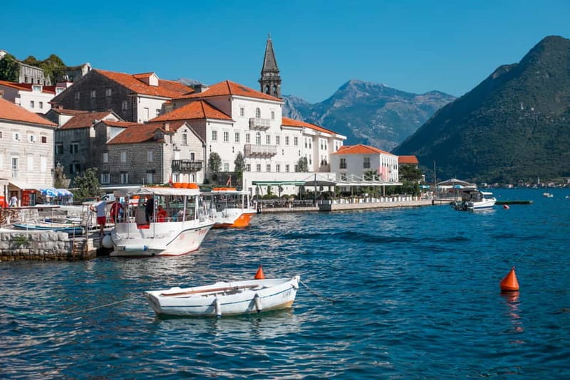 From Dubrovnik: Montenegro Day Trip with Cruise in Kotor Bay - The Bay of Kotor coastline: orange roofs, steep hills, big photos