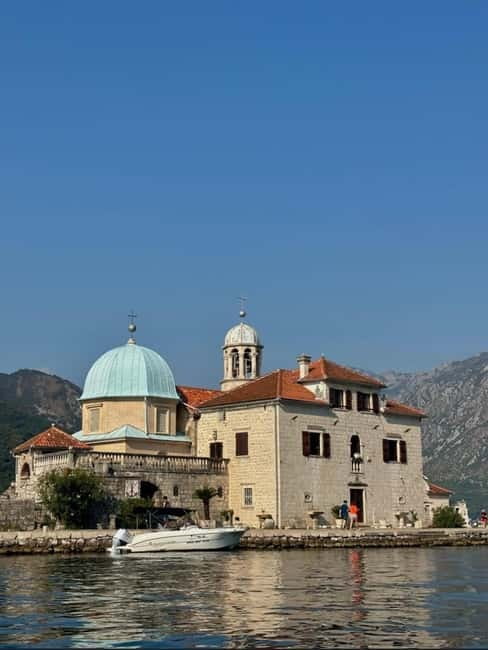 Kotor: Our Lady of the Rocks and Blue Cave Group Boat Tour - Our Lady of the Rocks and the Perast side of the bay