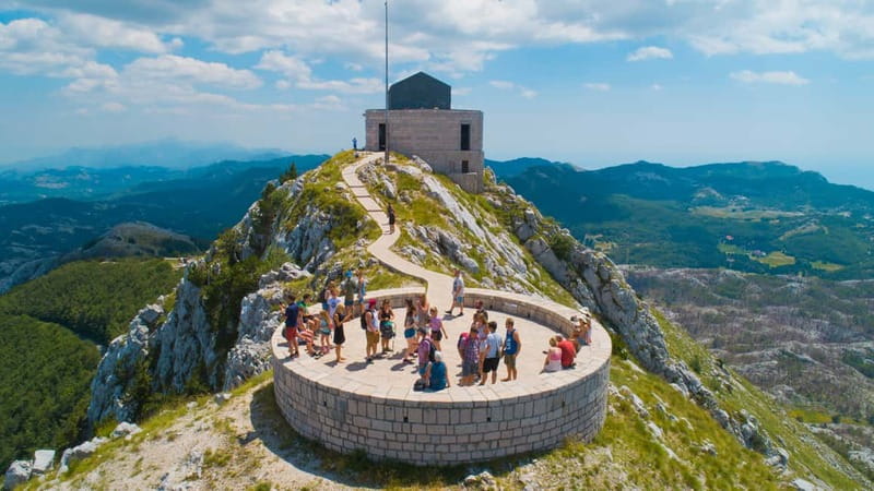 Montenegro: Full-Day Tour to Lovcen National Park & More - Kotor to Lovćen: cable car views, serpentine road backup, and how the day starts