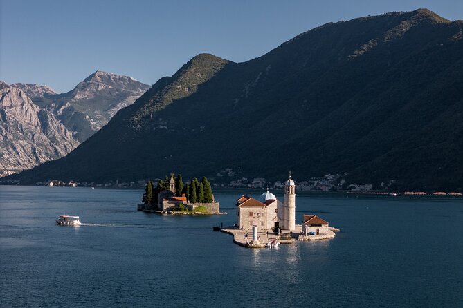 Private Guided Tour in Kotor Bay with Speedboat Food and Wine - Our Lady of the Rocks: A Man-Made Island With Real Ongoing Traditions