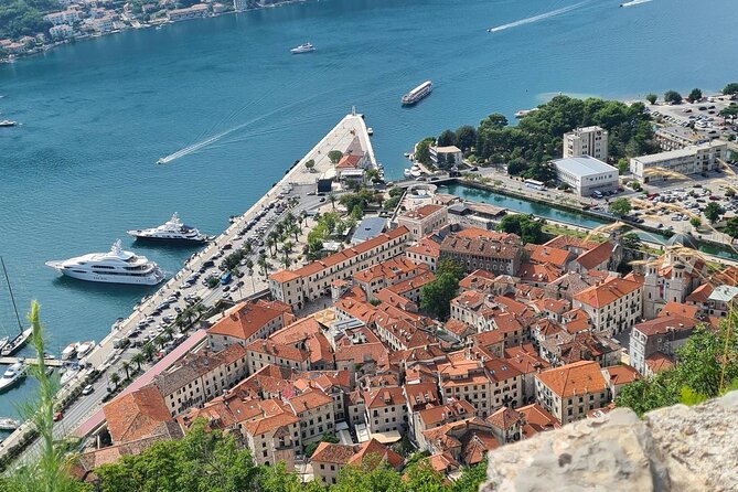 Self Guided Stroll Through Old Town of Kotor - Stop 1, Sea Gate: symbols, meaning, and a fast way to get oriented