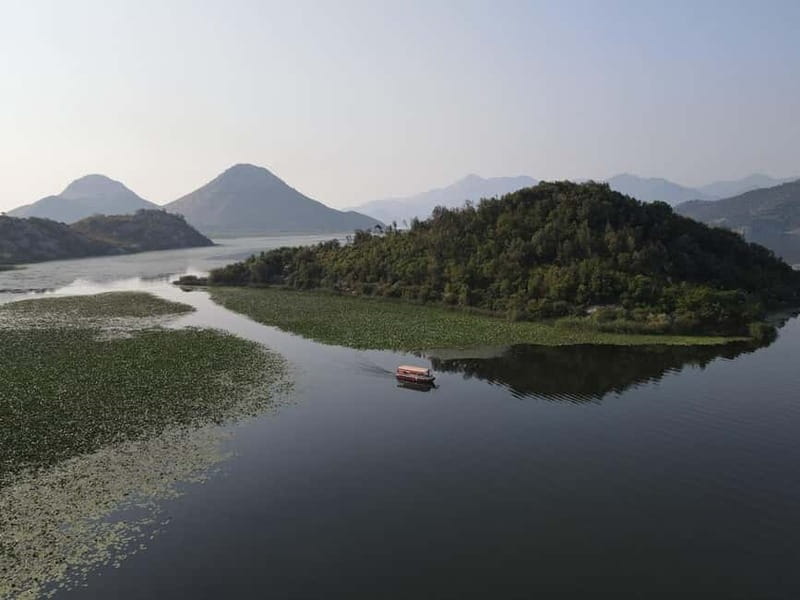 Skadar lake cruise - Virpazar - Kom monastery - Virpazar - Kom Monastery: medieval frescoes on an island and a terrace made for photos