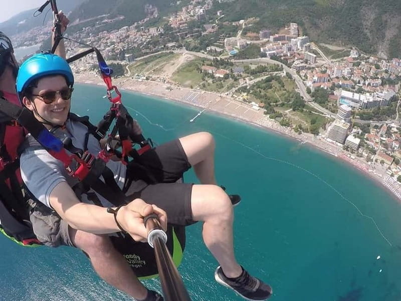 Tandem Paragliding in Budva with Expert Pilots/All-inclusive - Landing Near Budva City Beach and Receiving Your GoPro Footage